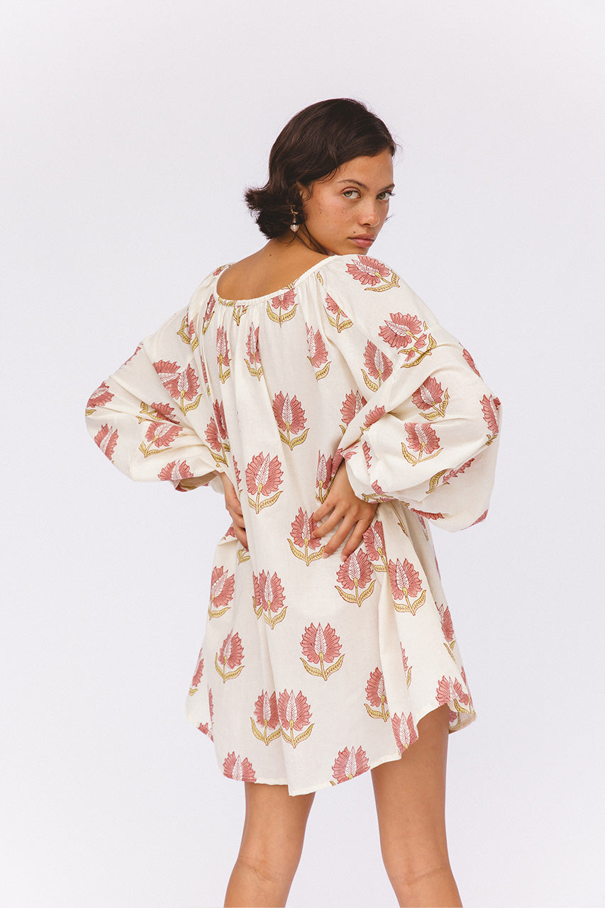 Ria Mini Dress Strawberry Cream — studio mid-body front view, model wearing strawberry cream floral hand block print cotton mini dress, puff sleeve detail with above-knee hemline, artisan Jaipur India | Daughters of India