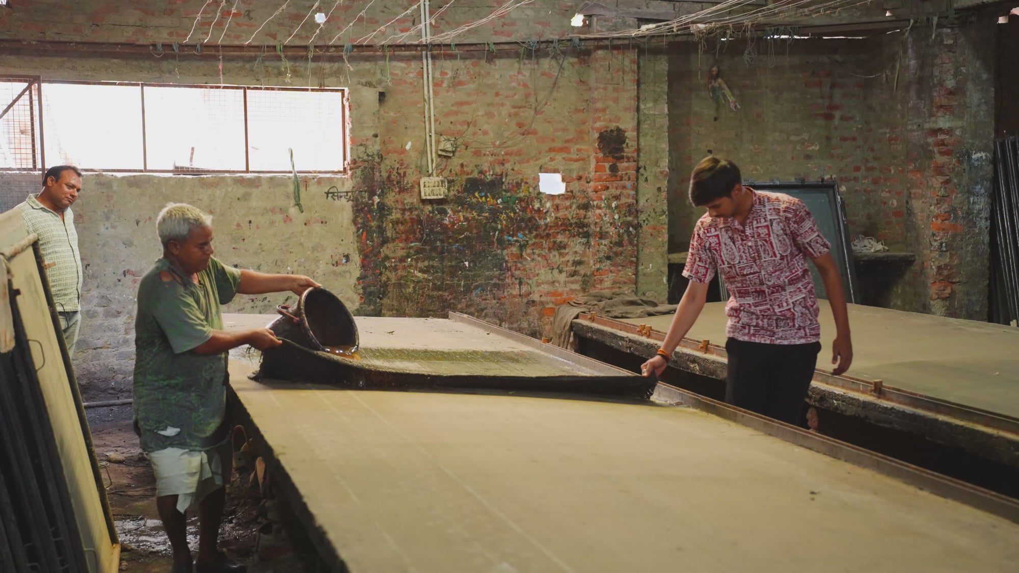 Making of Zahra Marmalade - discharge screen printing in landscape, artisans building the Marmalade design on pre-dyed fabric